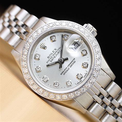 LADIES 18K ROLEX OYSTER PERPETUAL DATEJUST WATCH.